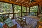 Large screened in porch overlooking the water